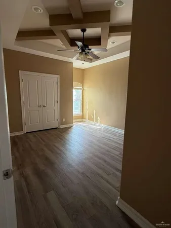 a view of a livingroom with wooden floor