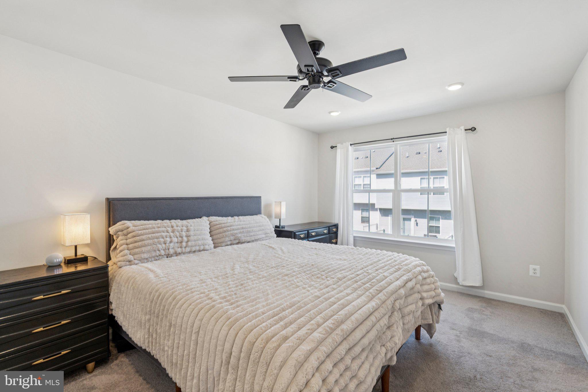 79 Swan Fld Avenue Ranson, WV 25438 - Photo 11 of 22 a bedroom with a large bed and a window