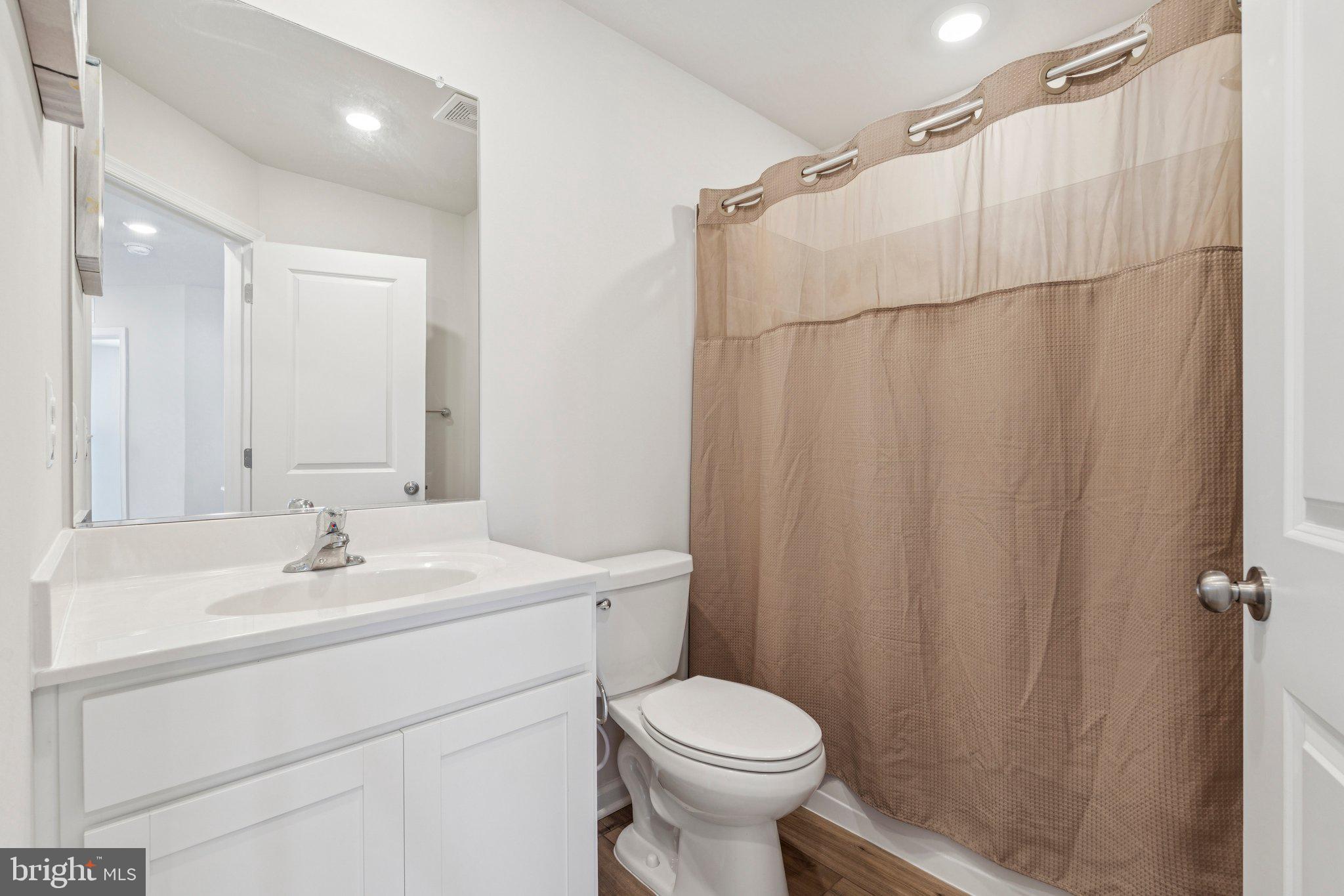 79 Swan Fld Avenue Ranson, WV 25438 - Photo 17 of 22 a bathroom with a sink toilet and shower