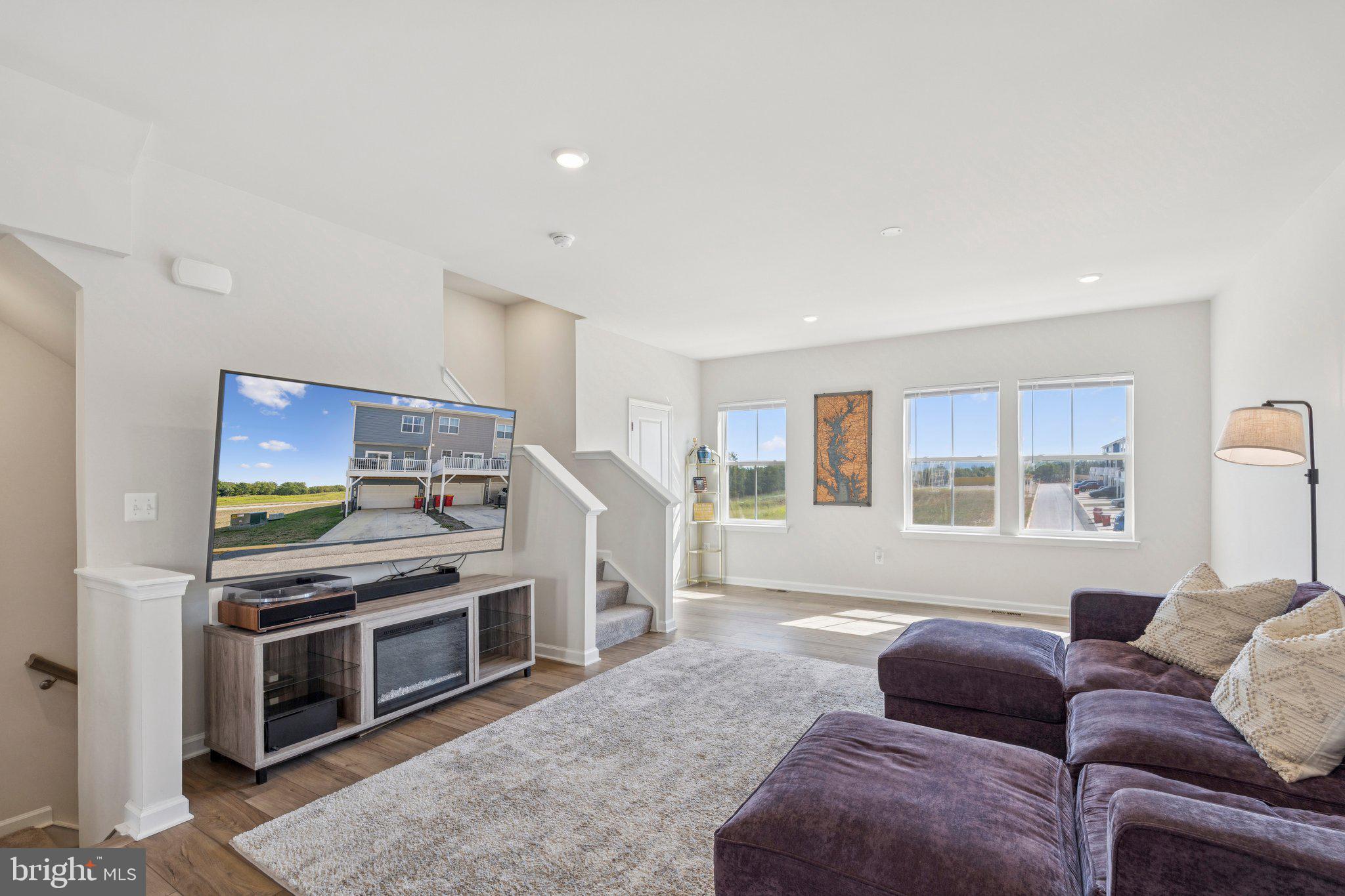 79 Swan Fld Avenue Ranson, WV 25438 - Photo 8 of 22 a living room with furniture and a fireplace