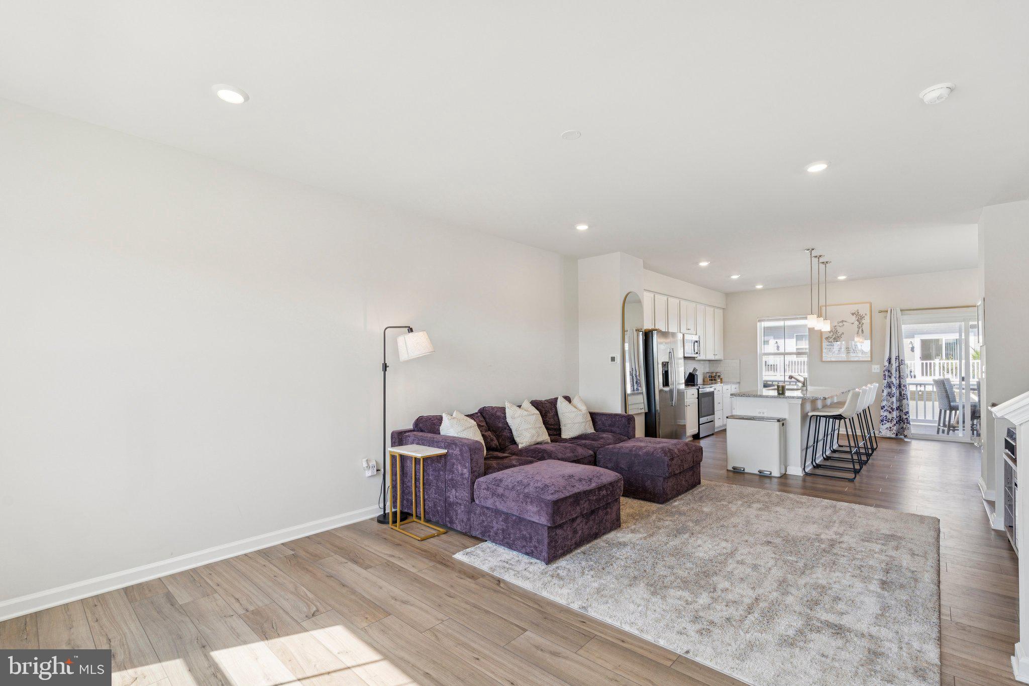 79 Swan Fld Avenue Ranson, WV 25438 - Photo 22 of 22 a living room with furniture and view of kitchen