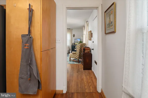 a view of a hallway with a furniture