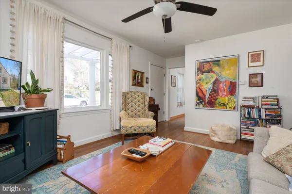 a living room with furniture and window