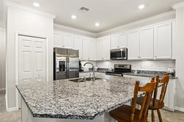 $479,000 | 9113 Glenforest Drive, Naples, FL 34120