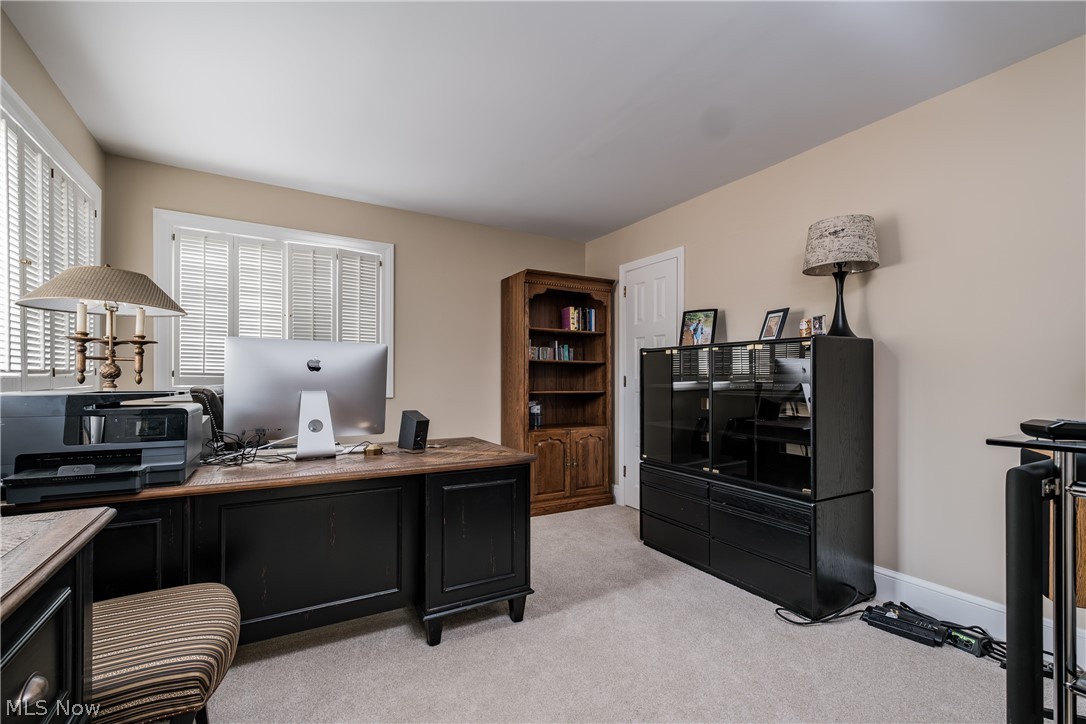 1415 Harbor Drive Northwest Canton, OH 44708 - Photo 35 of 46 2nd floor Bedroom with light carpet and plantation shutters