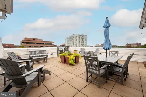 a view of a workspace with furniture