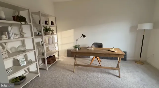 a living room with fireplace furniture and a flat screen tv