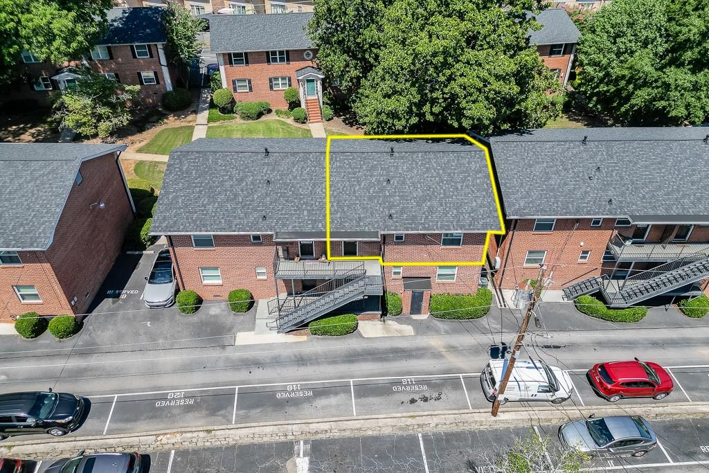 4282 Roswell Road Northeast, Unit D2 Atlanta, GA 30342 - Photo 38 of 42 an aerial view of a house with garden space and street view