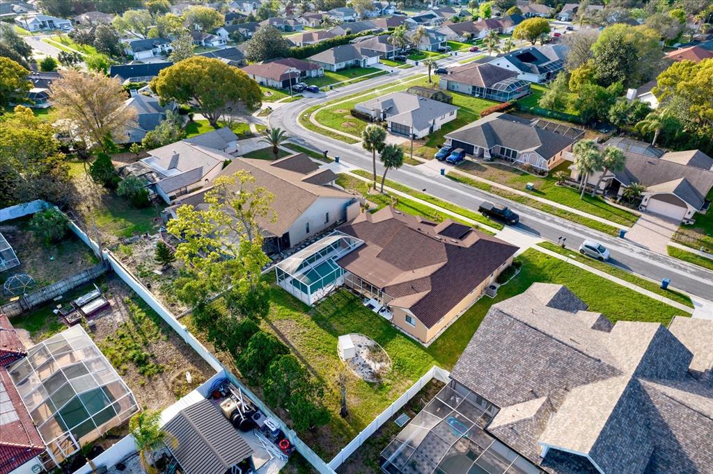 1503 Overland Drive Spring Hill, FL 34608 - Photo 22 of 24 an aerial view of residential houses with outdoor space