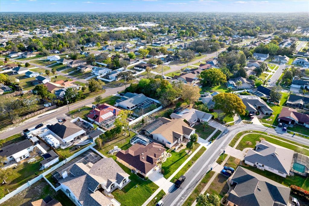 1503 Overland Drive Spring Hill, FL 34608 - Photo 23 of 24 an aerial view of residential houses with outdoor space