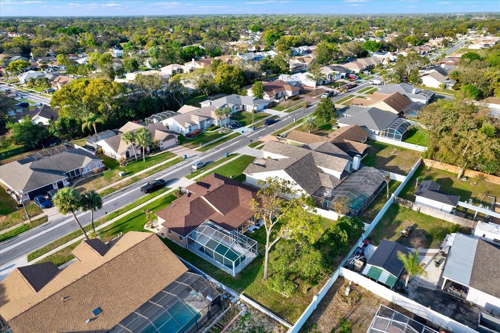 1503 Overland Drive Spring Hill, FL 34608 - Photo 24 of 24 an aerial view of residential houses with outdoor space