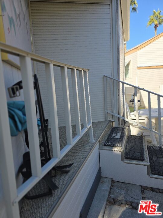 84136 Ave 44, Unit 660 Indio, CA 92203 - Photo 12 of 16 a view of entryway and hall with wooden floor