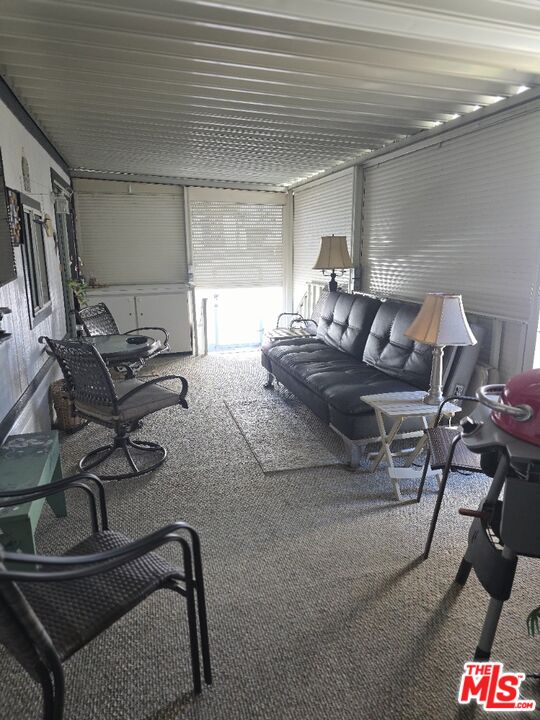 84136 Ave 44, Unit 660 Indio, CA 92203 - Photo 3 of 16 a living room with furniture