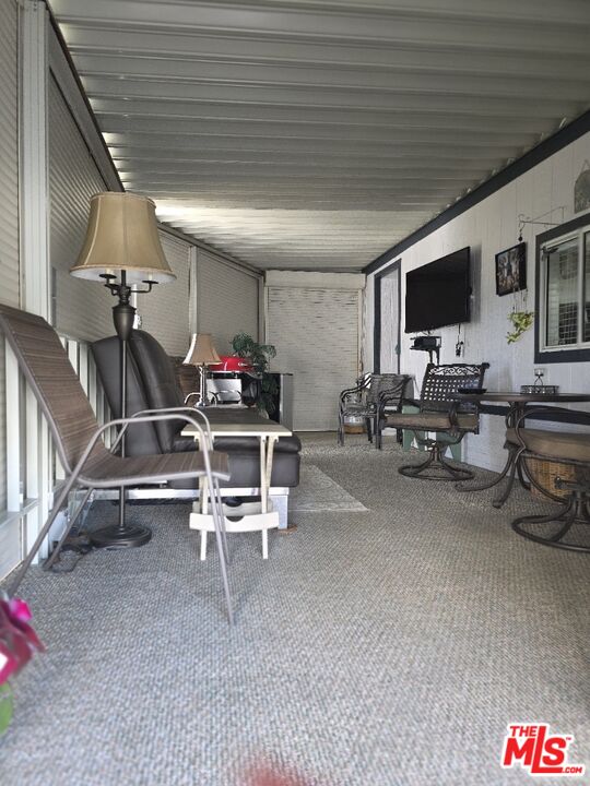 84136 Ave 44, Unit 660 Indio, CA 92203 - Photo 6 of 16 a living room with furniture