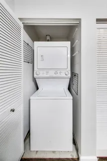 a view of a brick building with many windows