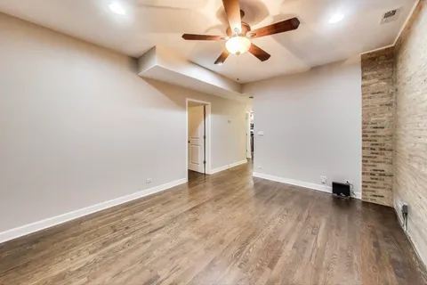 a kitchen with stainless steel appliances a refrigerator and a stove