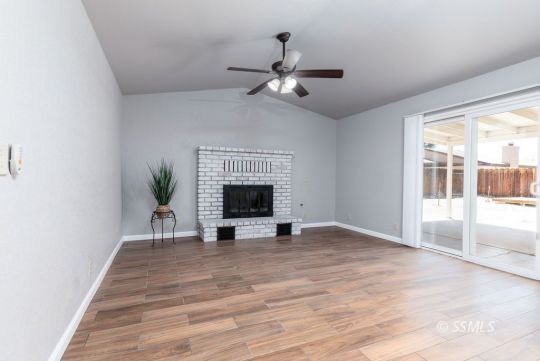 601 South Gold Canyon Street Ridgecrest, CA 93555 - Photo 15 of 34 a view of empty room with wooden floor and fan