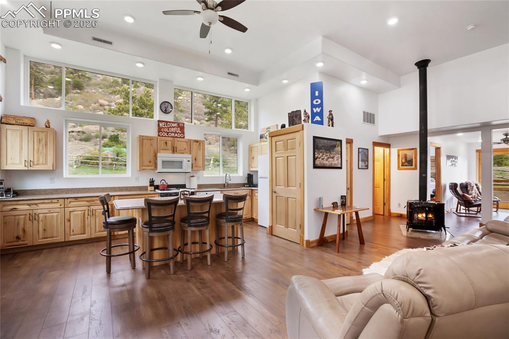 437 Langnis Road Guffey, CO 80820 - Photo 16 of 33 A nice big kitchen with windows that will draw you in like a good novel telling you the most beautiful story.