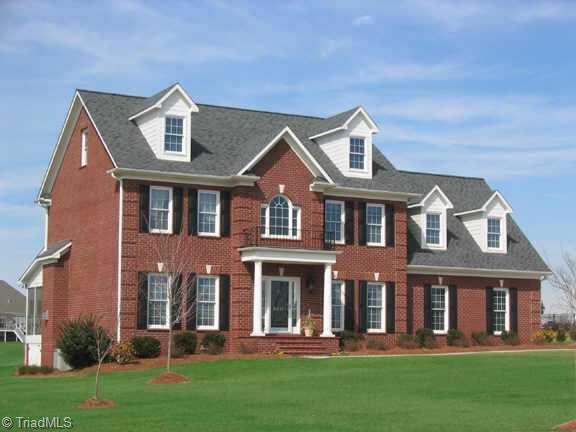 5611 Foxbury Drive Oak Ridge, NC 27310 - Photo 1 of 8 Exterior Front.