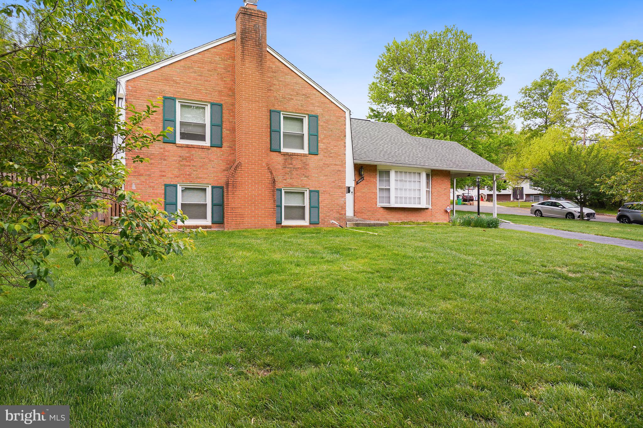 16011 Jerald Road Laurel, MD 20707 - Photo 2 of 5 a front view of a house with a yard