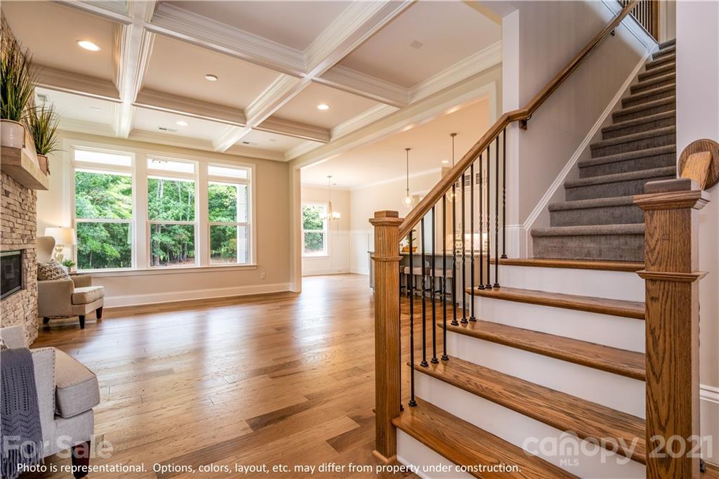 357 Grassy Rdg Court, Unit 50 Clover, SC 29710 - Photo 14 of 27 a view of staircase with lots of wooden floor and windows