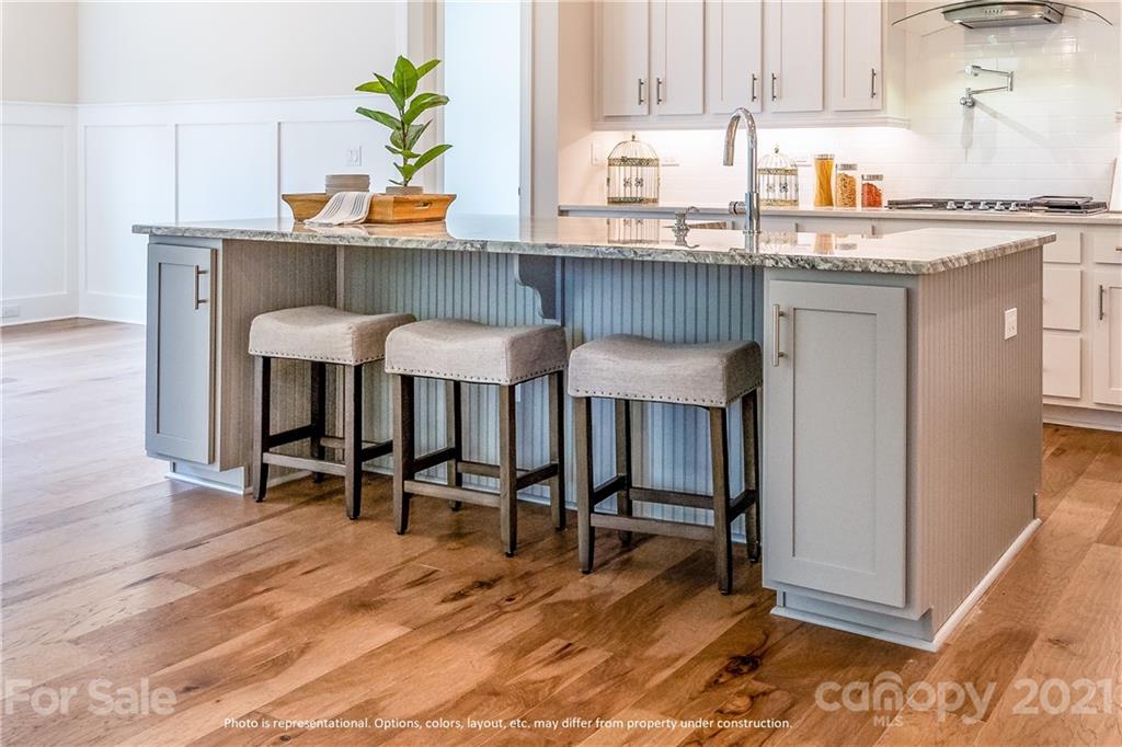 357 Grassy Rdg Court, Unit 50 Clover, SC 29710 - Photo 3 of 27 a kitchen with a table chairs and entryway