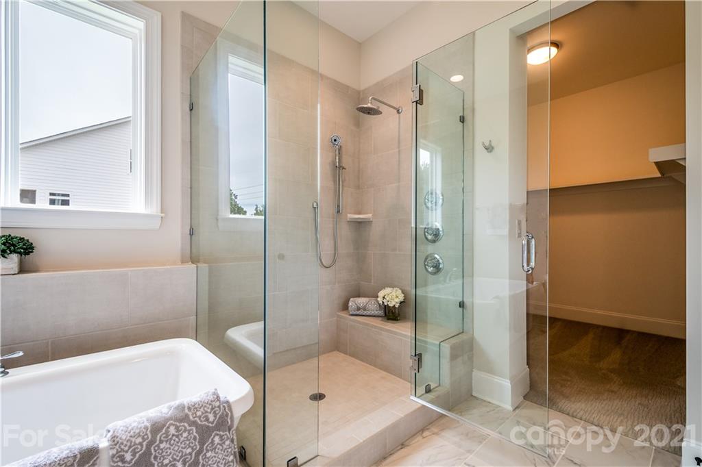 357 Grassy Rdg Court, Unit 50 Clover, SC 29710 - Photo 22 of 27 a bathroom with a bathtub and a shower