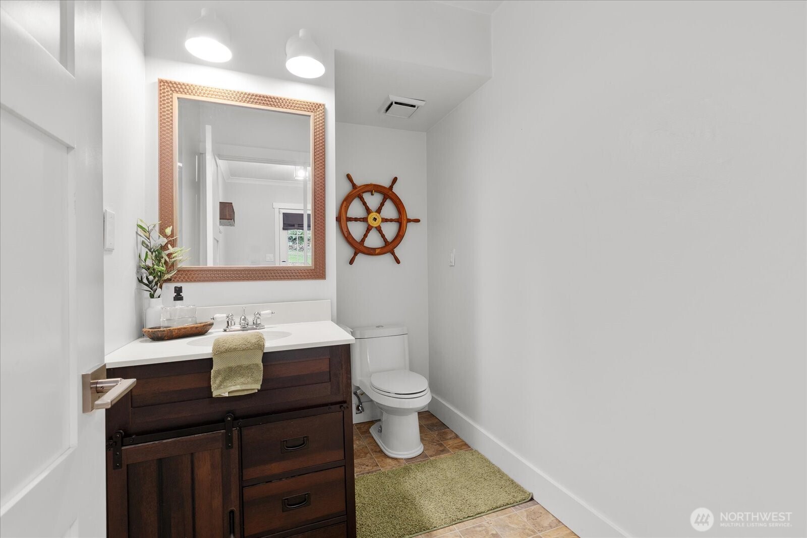 13425 North Echo Lake Road Snohomish, WA 98296 - Photo 25 of 39 a bathroom with a granite countertop sink a toilet and a mirror