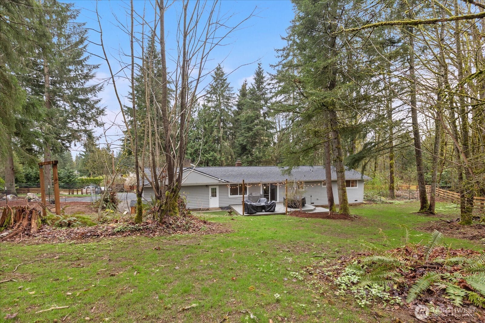 13425 North Echo Lake Road Snohomish, WA 98296 - Photo 28 of 39 a front view of a house with a yard tree and outdoor seating