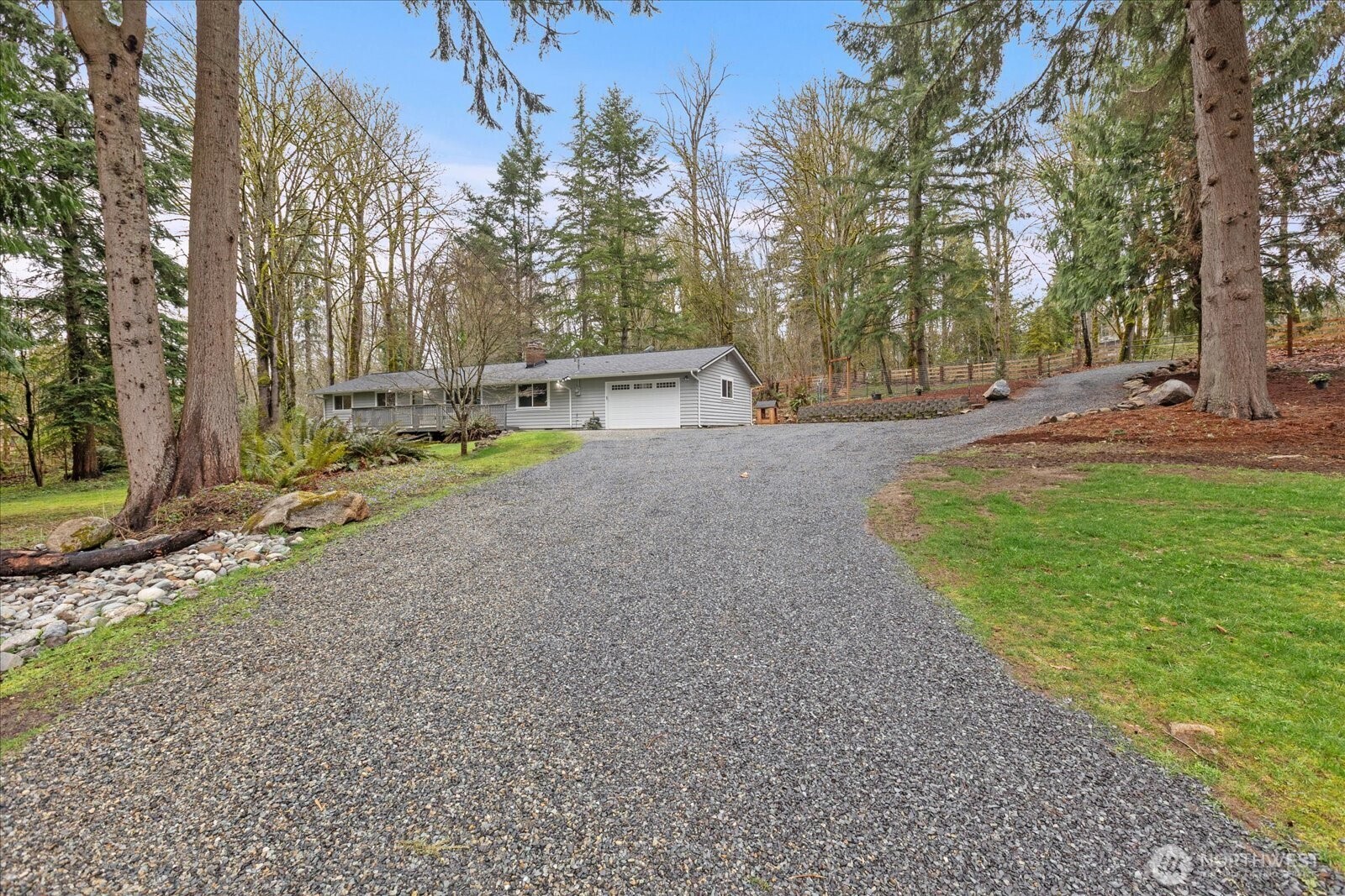 13425 North Echo Lake Road Snohomish, WA 98296 - Photo 31 of 39 a view of a house with backyard and trees