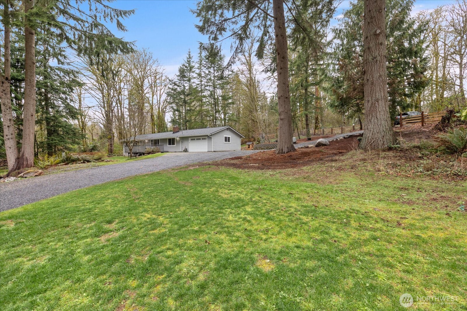 13425 North Echo Lake Road Snohomish, WA 98296 - Photo 33 of 39 a view of a backyard with a small cabin
