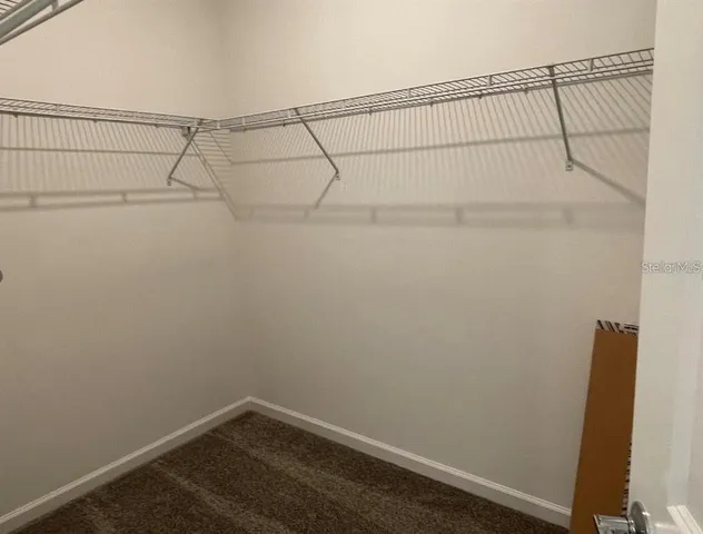 a view of small space with racks on the wall