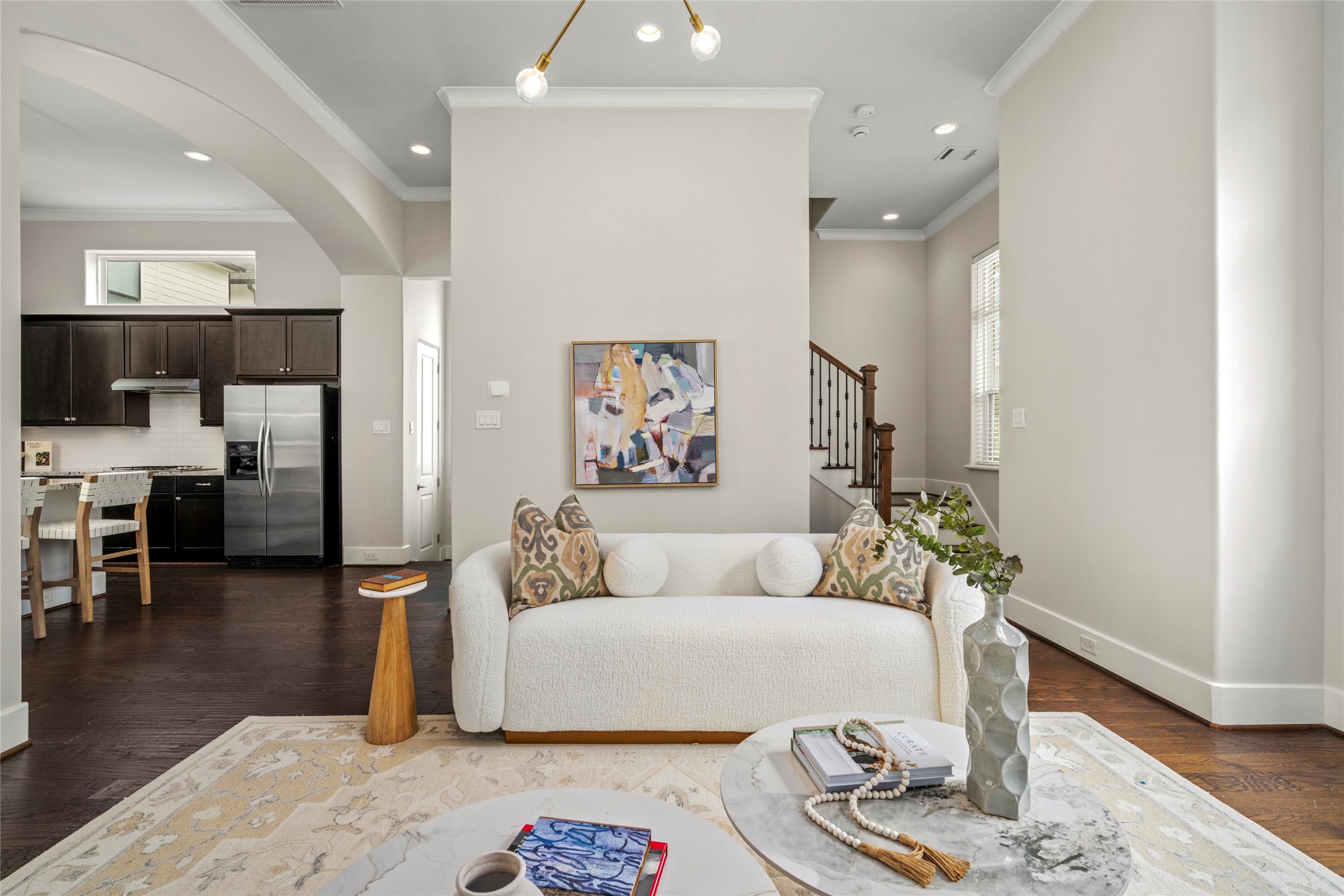 5646 Larkin Street Houston, TX 77007 - Photo 2 of 29 The main living space feels open and connected, with tall ceilings and natural light carrying throughout.