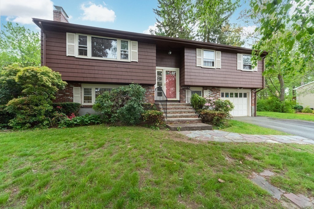 10 Fencourt Road Canton, MA 02021 - Photo 23 of 29 a house that has a lot of plants in it