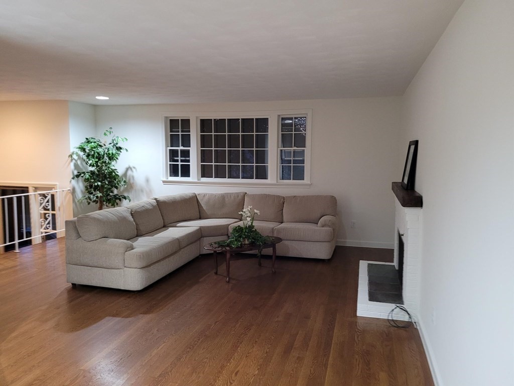 10 Fencourt Road Canton, MA 02021 - Photo 3 of 29 a living room with furniture and a window