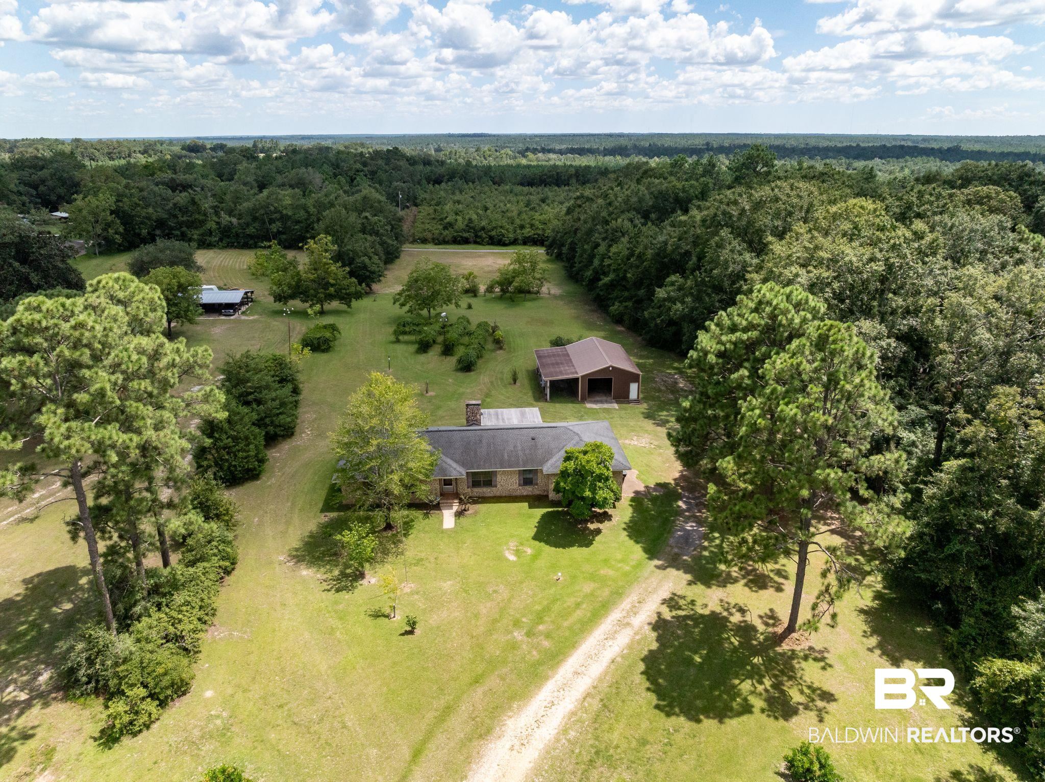 15880 Pine Grove Rd Extension West Bay Minette, AL 36507 - Photo 36 of 44 Drone / aerial view with a rural view