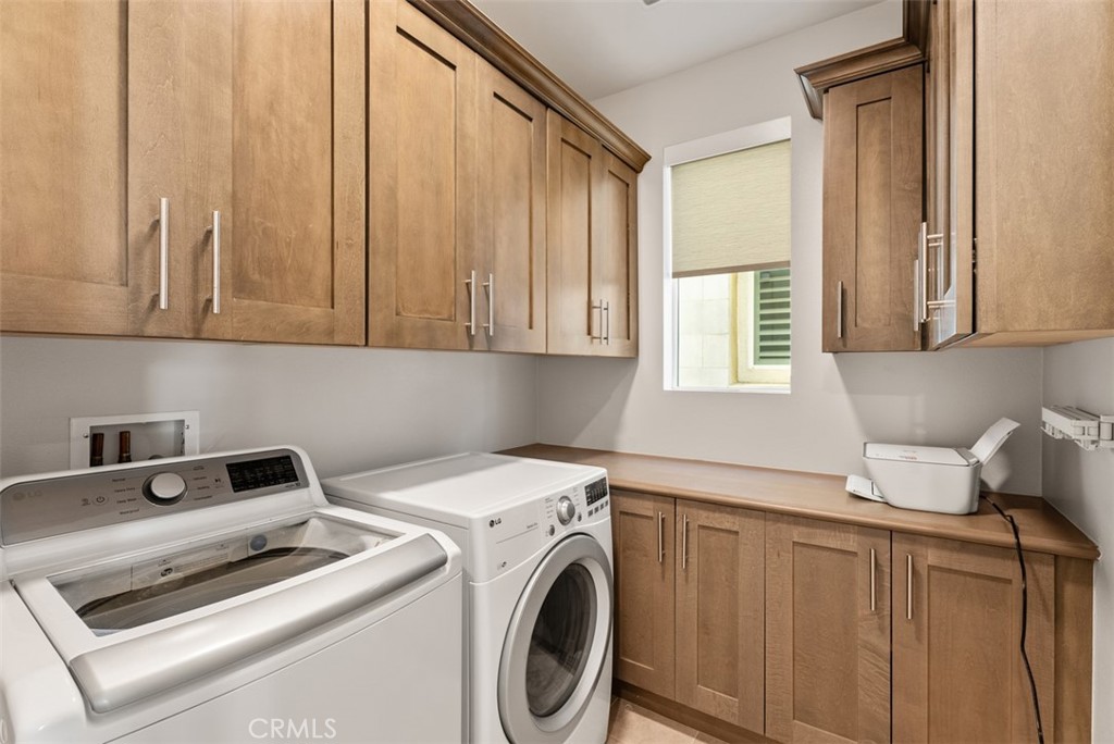 2559 Doheny Way Dana Point, CA 92629 - Photo 13 of 30 Individual laundry room with custom built in cabinets