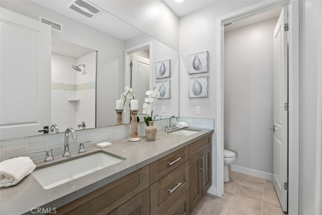 2559 Doheny Way Dana Point, CA 92629 - Photo 15 of 30 Dual sinks in secondary bedroom bath