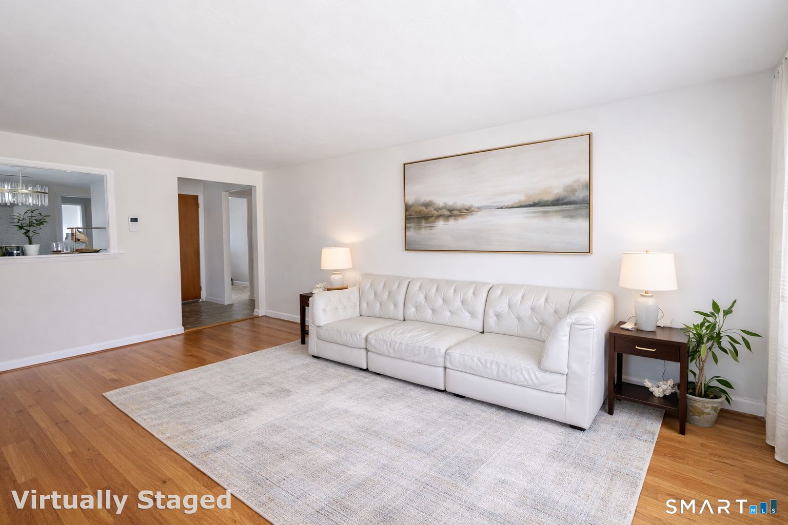 158 Colton Street Windsor, CT 06095 - Photo 5 of 15 a living room with furniture and a rug