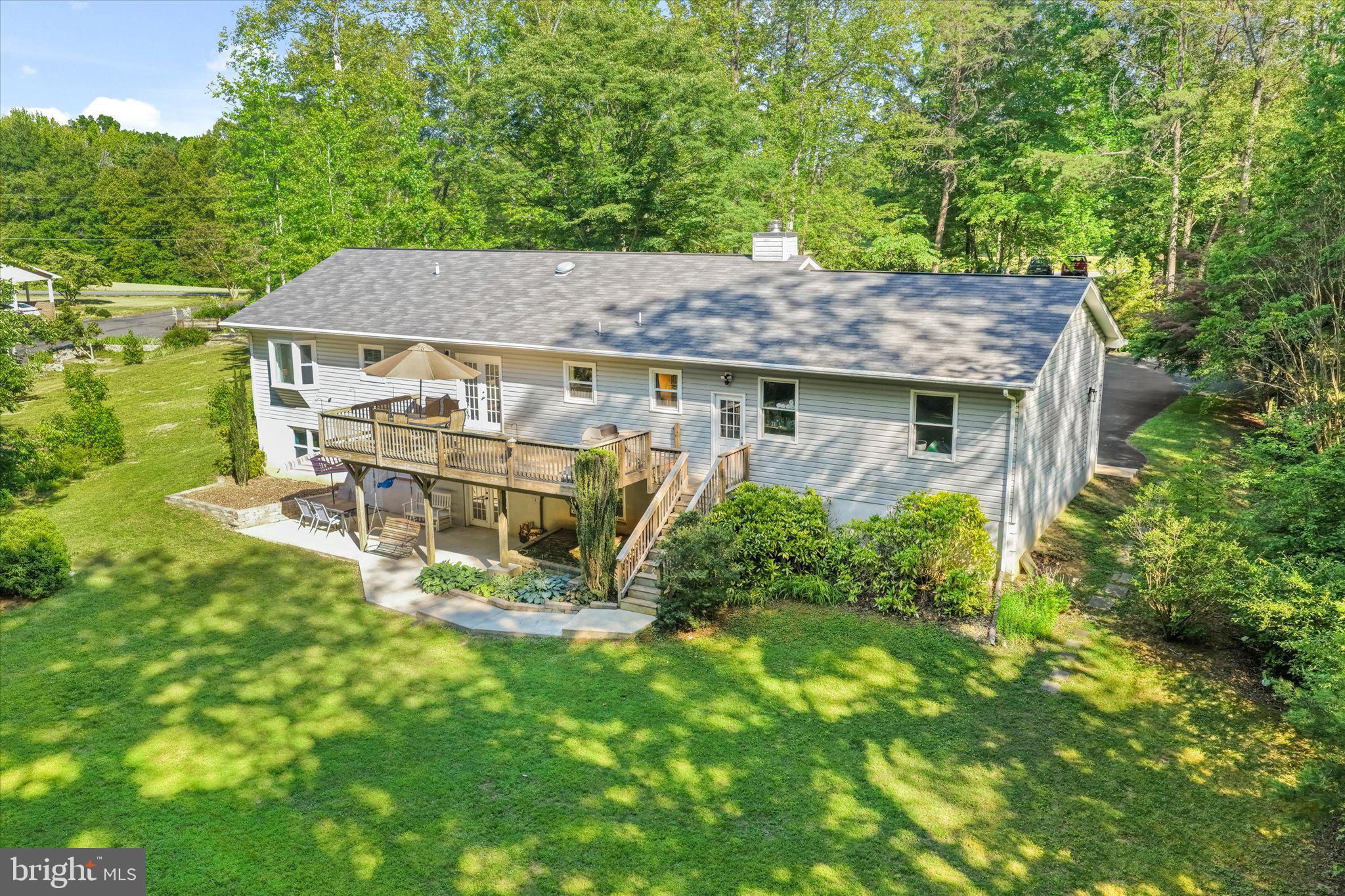 230 Richards Ferry Road Fredericksburg, VA 22406 - Photo 60 of 96 Charming home nestled in lush greenery.