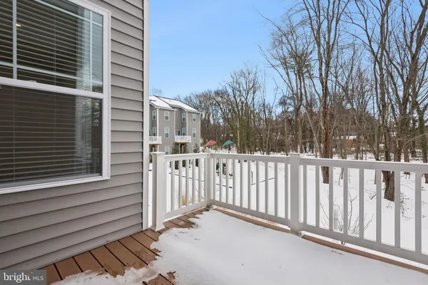 a view of a wooden fence from a house