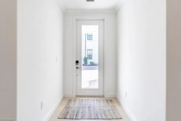 a view of a room that has a window in it