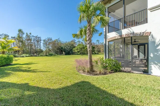 a view of a house with a swimming pool