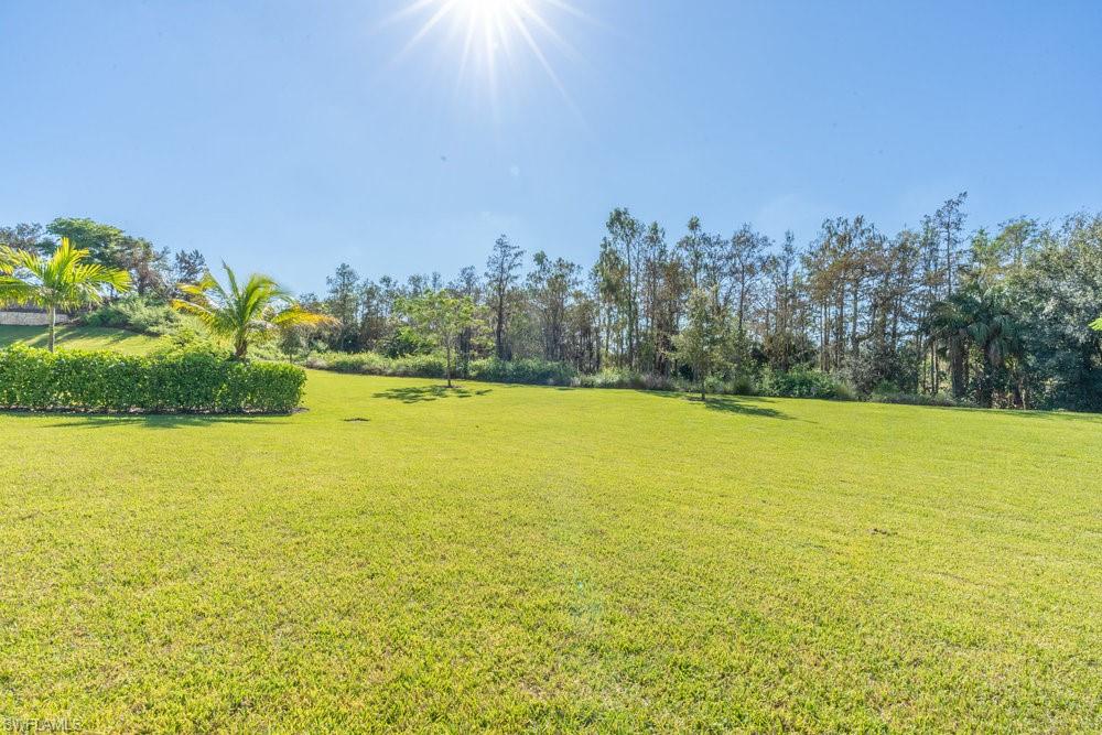 16352 Viansa Way, Unit 10101 Naples, FL 34110 - Photo 29 of 37 a view of an ocean and a mountain view