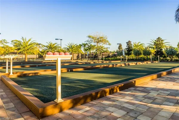 a view of a swimming pool and a chair