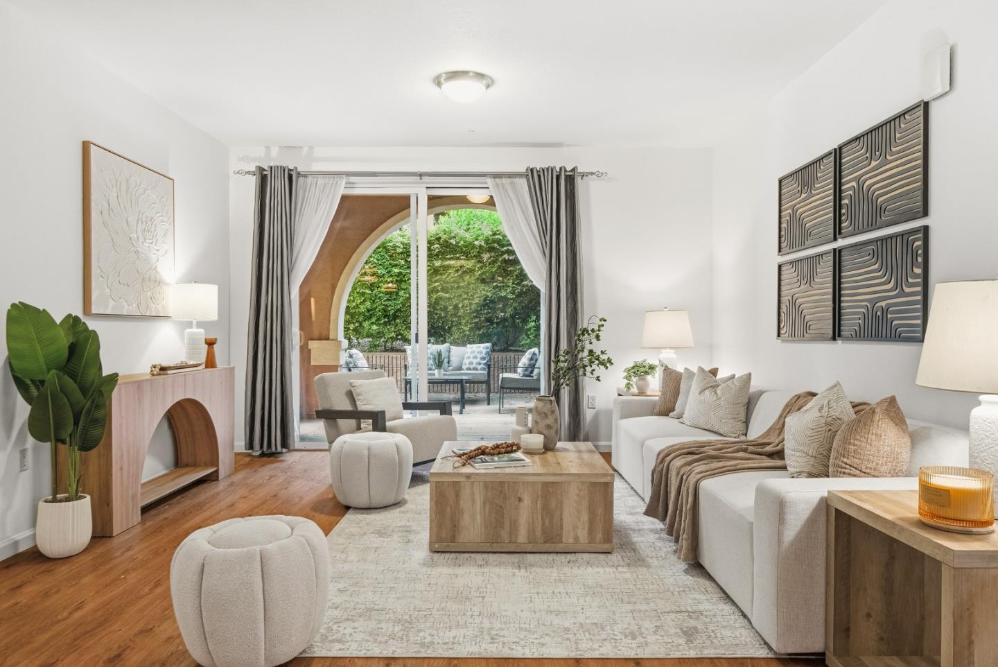1390 Saddle Rack Street, Unit 223 San Jose, CA 95126 - Photo 2 of 36 a living room with furniture and a large window