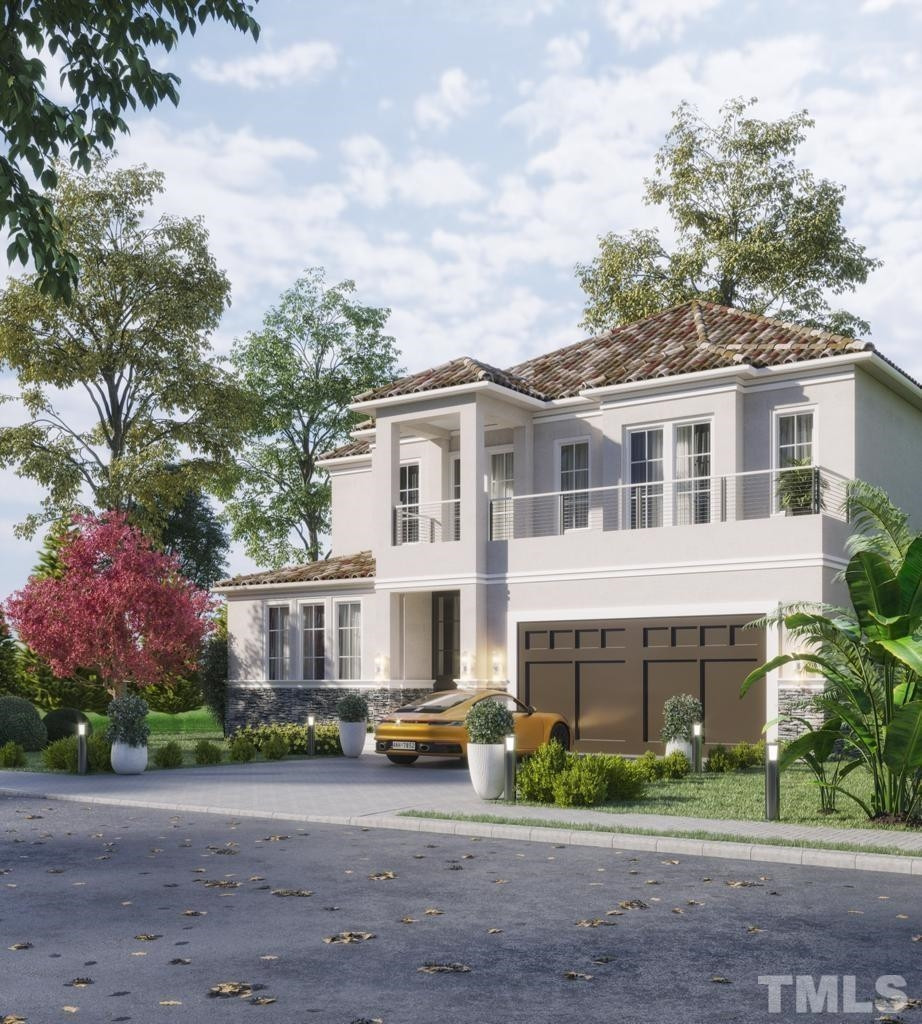 39 Treviso Place Durham, NC 27707 - Photo 2 of 18 a front view of a house with a garden