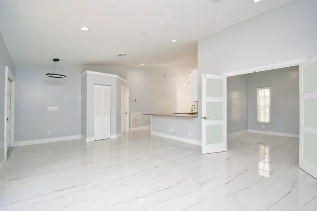 a view of a kitchen with a sink