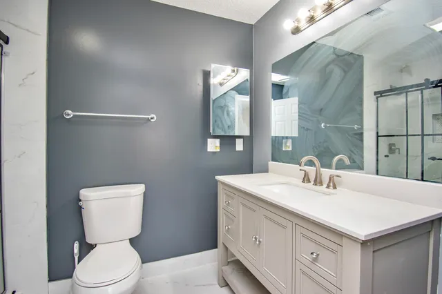 a view of hallway with stairs