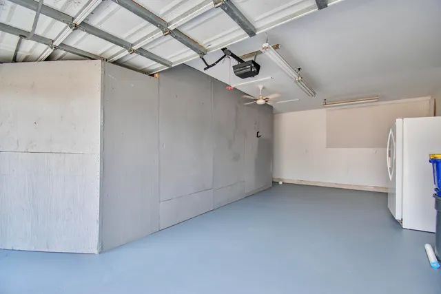 a view of a park with swings and slides